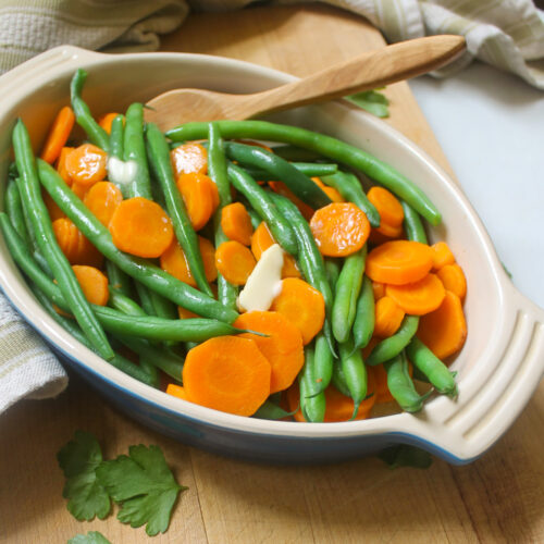 A simple side dish of blanched green beans and carrots.