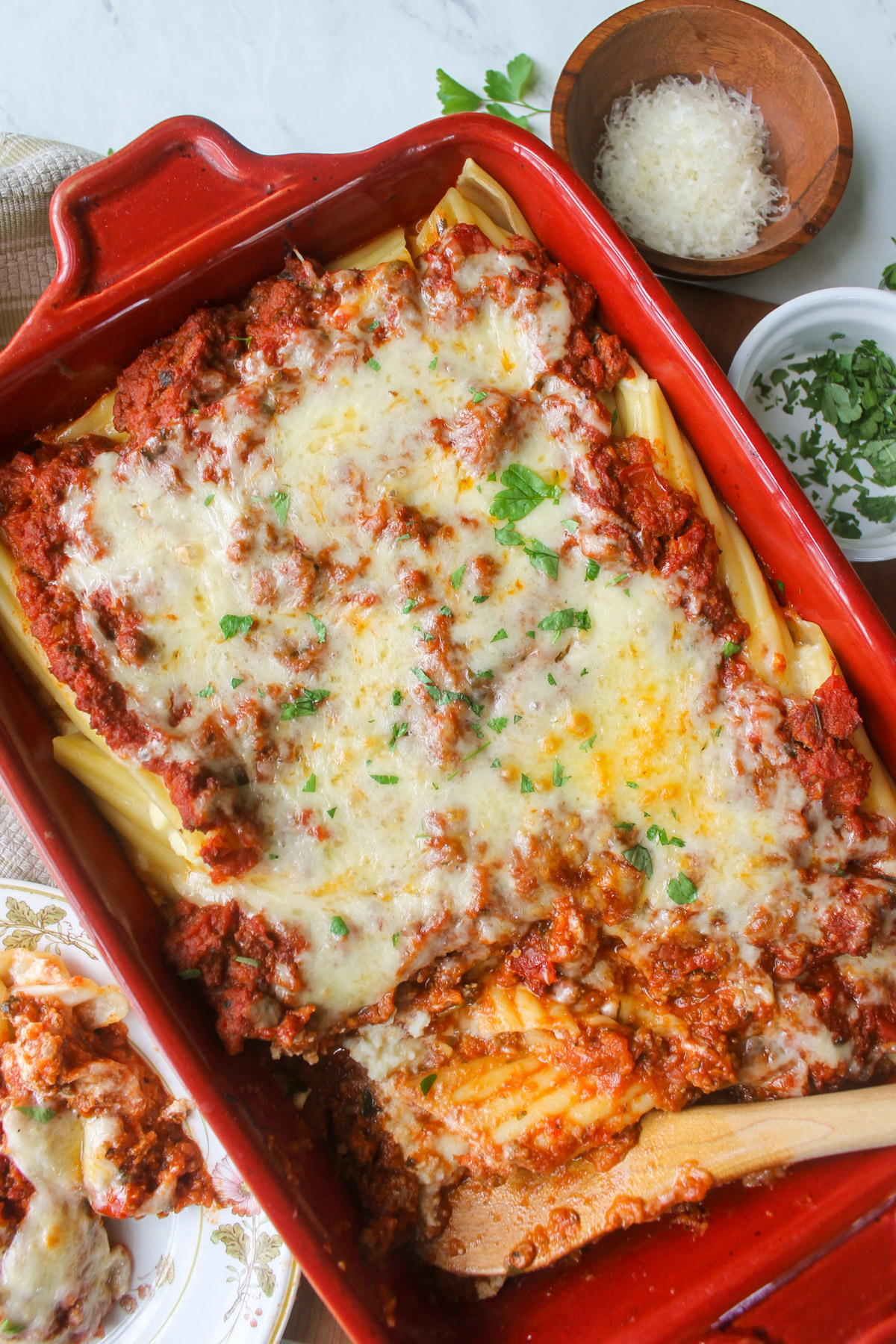 Baked manicotti with red sauce and melted cheese.