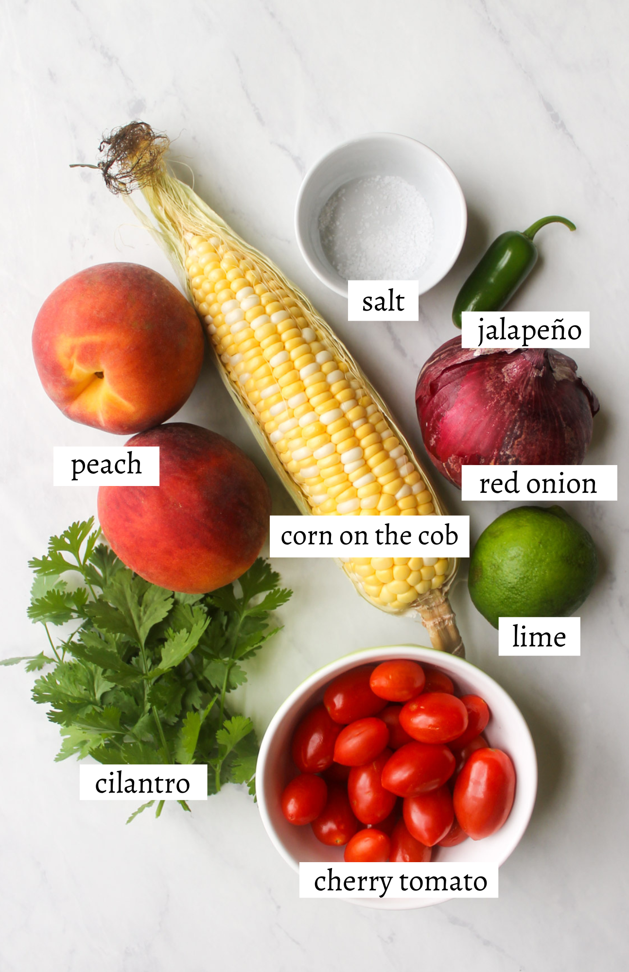 Labeled ingredients for peach corn salsa.