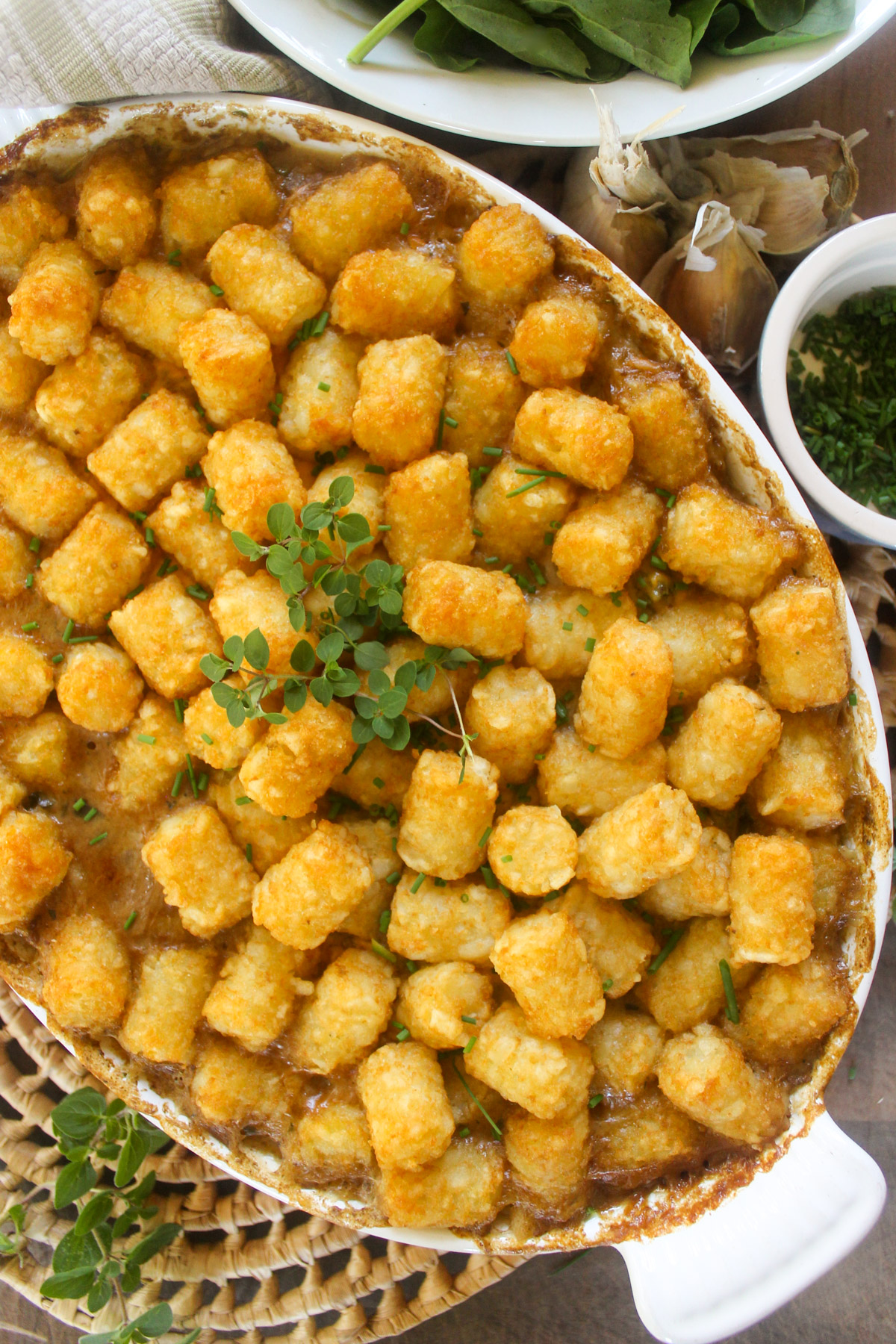 A baking dish of tater tot casserole.