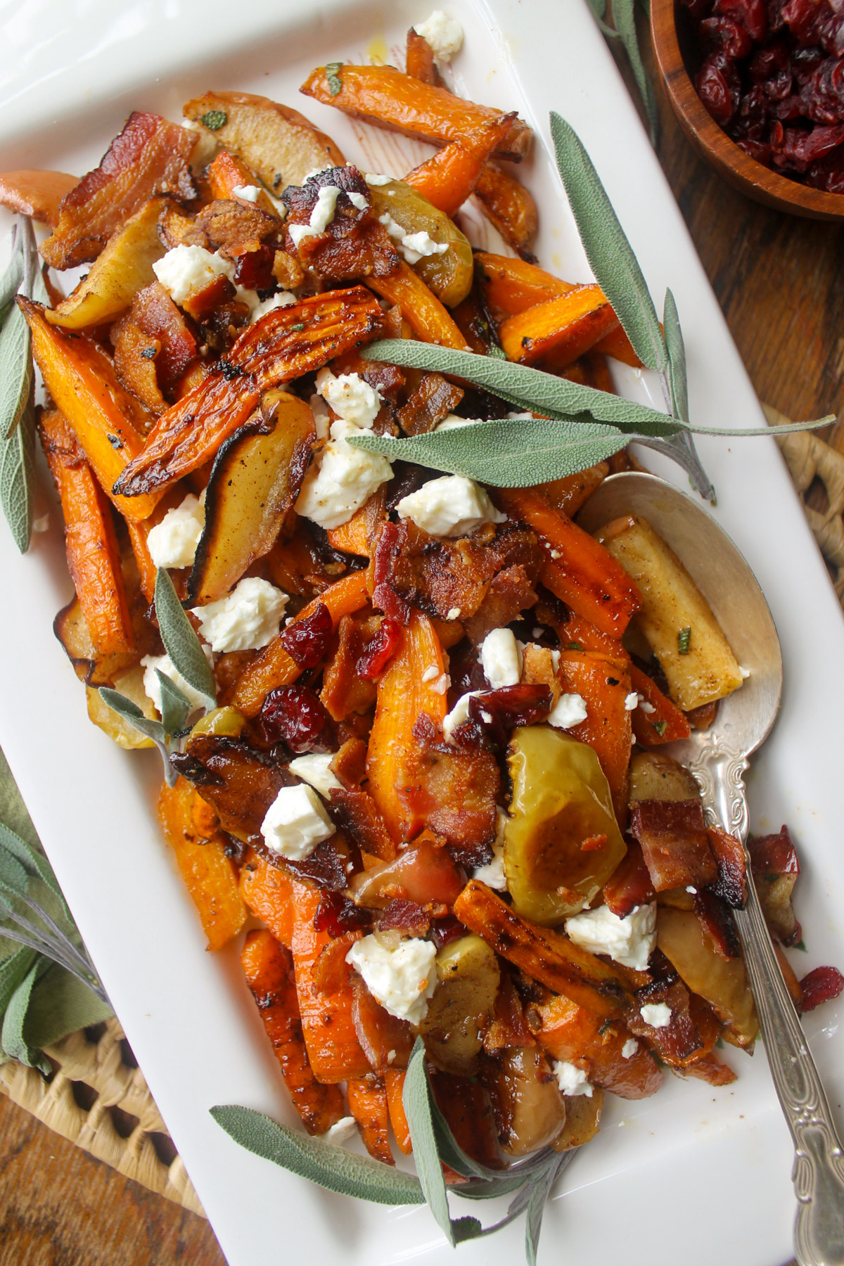 Roasted carrots and apples with dried cranberries and fresh sage.