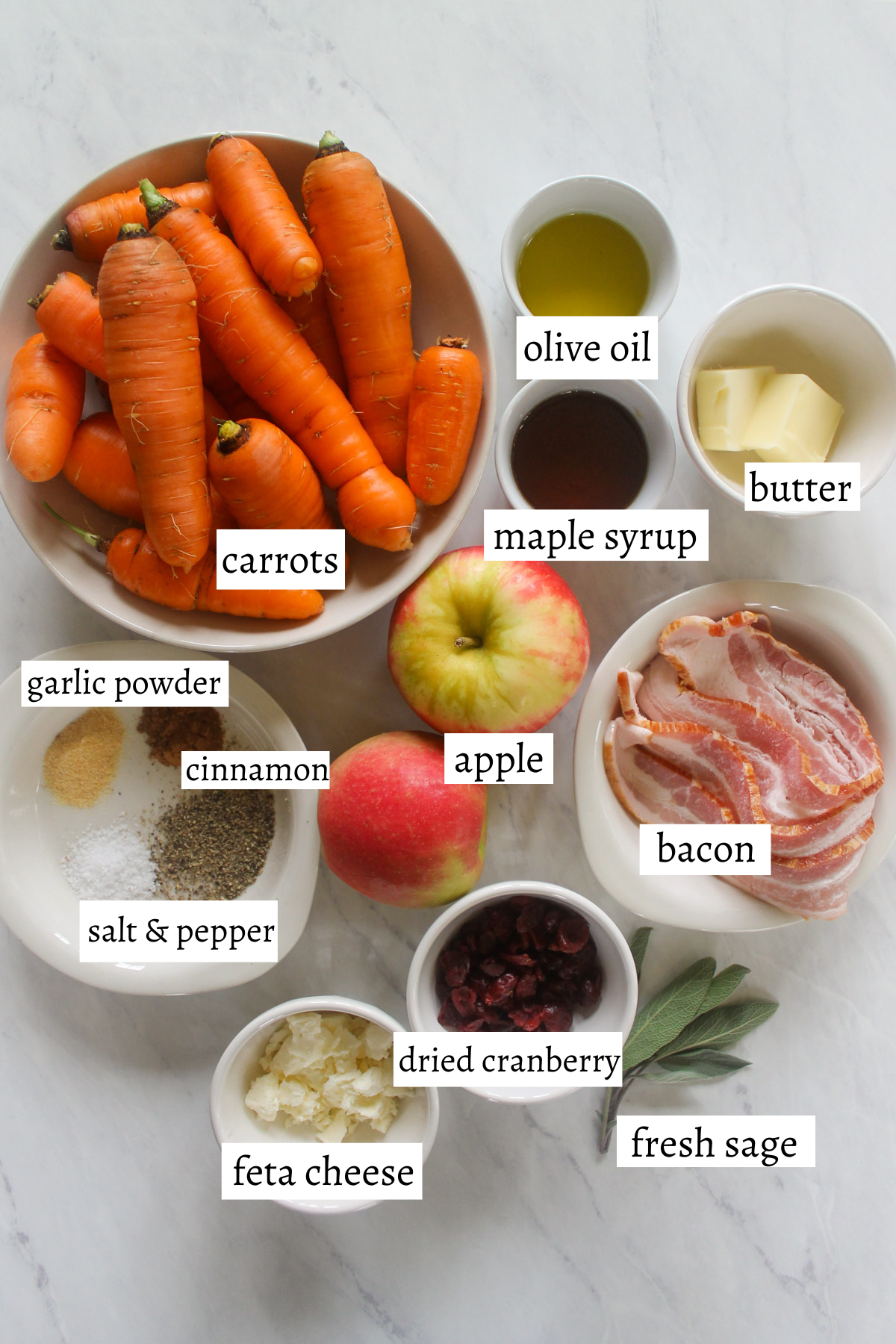 Labeled ingredients for maple roasted carrots and apples.