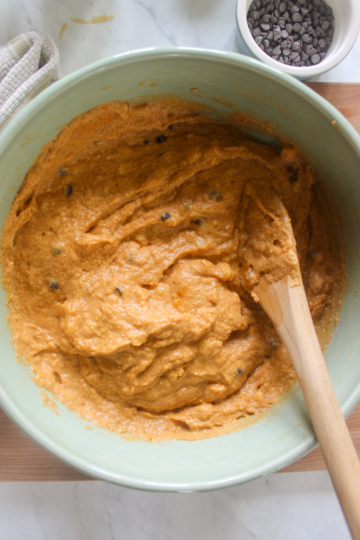 Pumpkin Banana Bread Muffins batter in a mixing bowl.