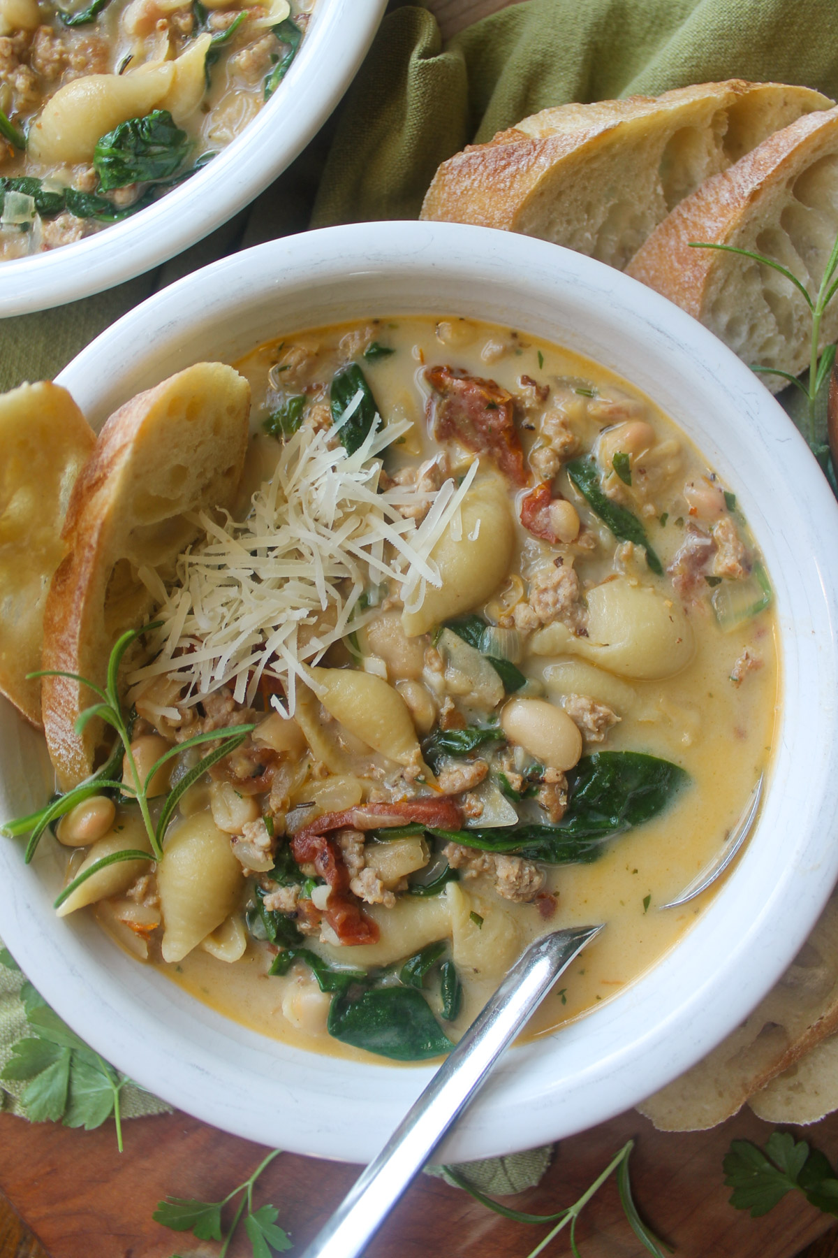 A bowl of Tuscan Sausage White Bean Soup.