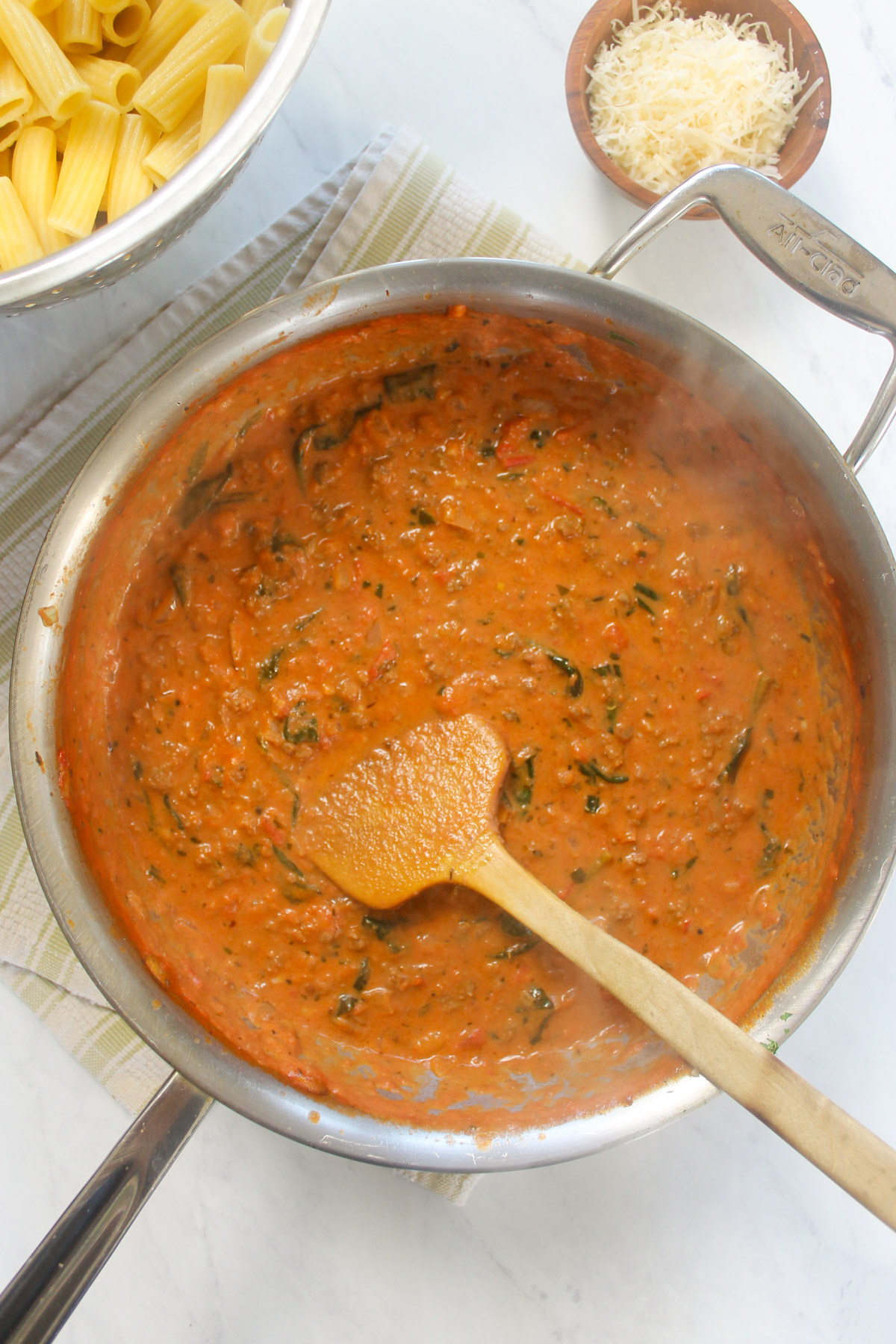 Spicy rigatoni meat sauce in a skillet.