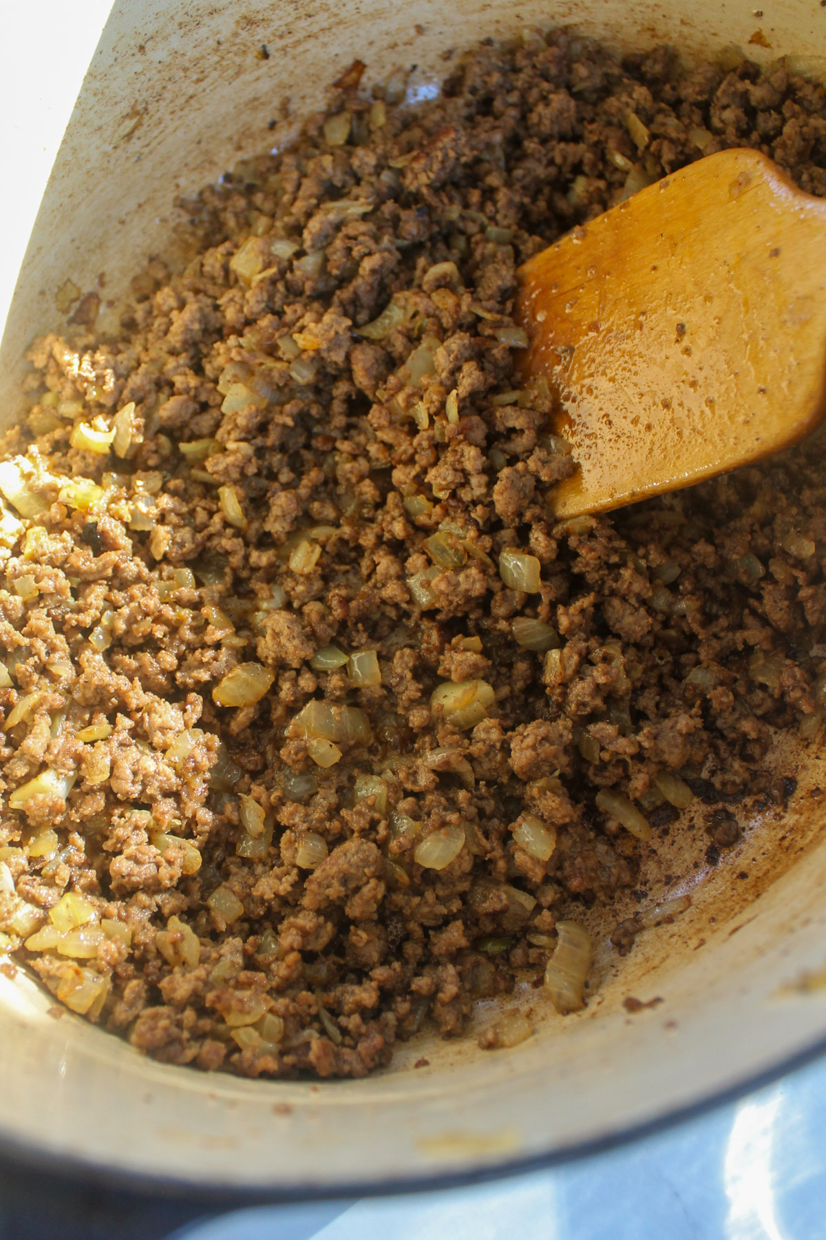 Ground beef and onions browned in a soup pot.