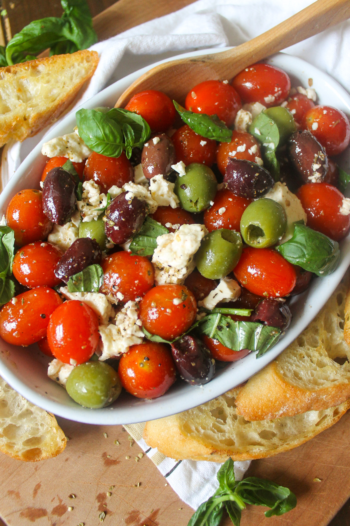 Kalamata and green olives mixed with feta cheese and cherry tomatoes.