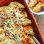 Stuffed shells with Italian sausage sauce.