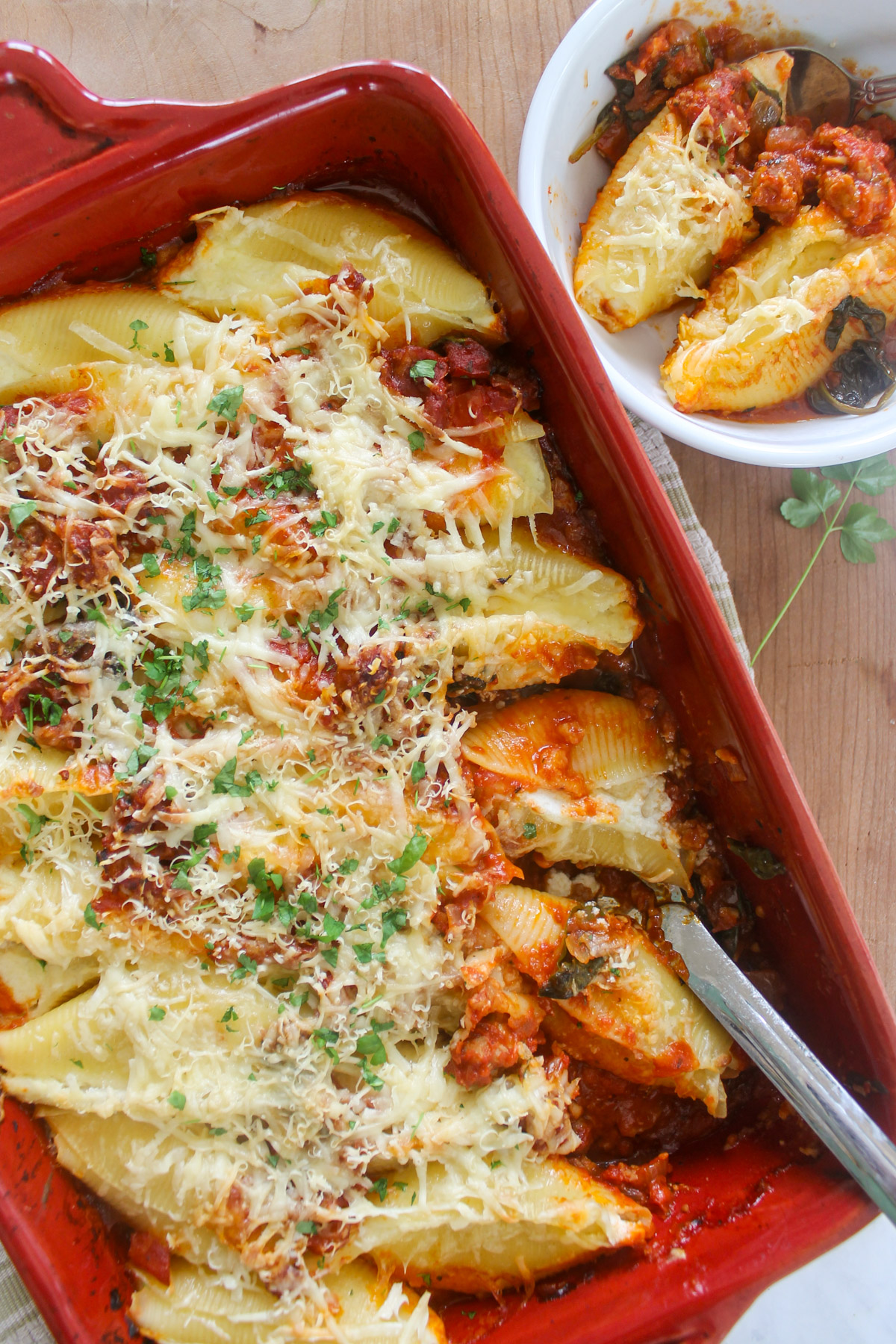 Ricotta and cottage cheese stuffed shells with meat sauce.